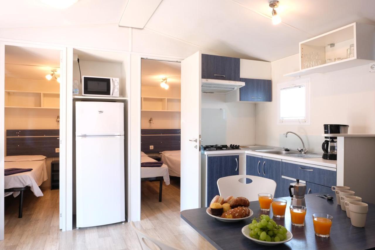Happy Camp Mobile Homes In Camping Village Free Time มารินา ดิ บิบโบนา ภายนอก รูปภาพ